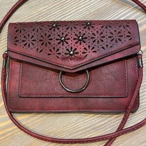 Cute little red/wine colored crossbody bag. NWOT!!!